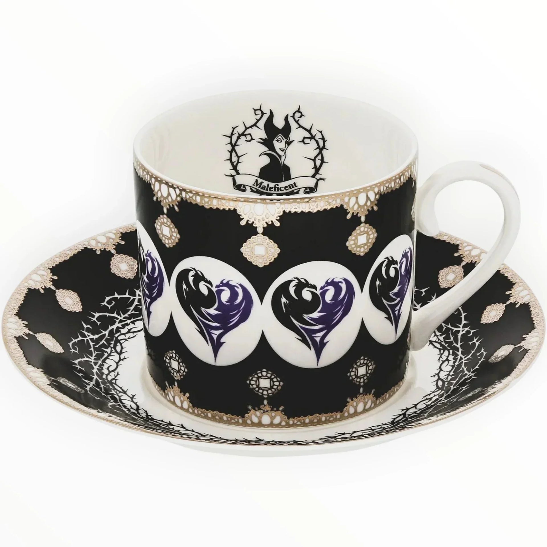 Maleficent-themed teacup and saucer with black, purple, and gold gothic design, featuring villain portrait and thorn motifs.