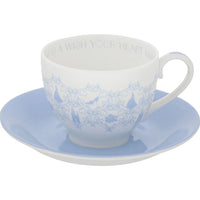 Elegant white teacup with blue Cinderella design and saucer, featuring 'Wish Your Heart' text, perfect for vintage home décor.
