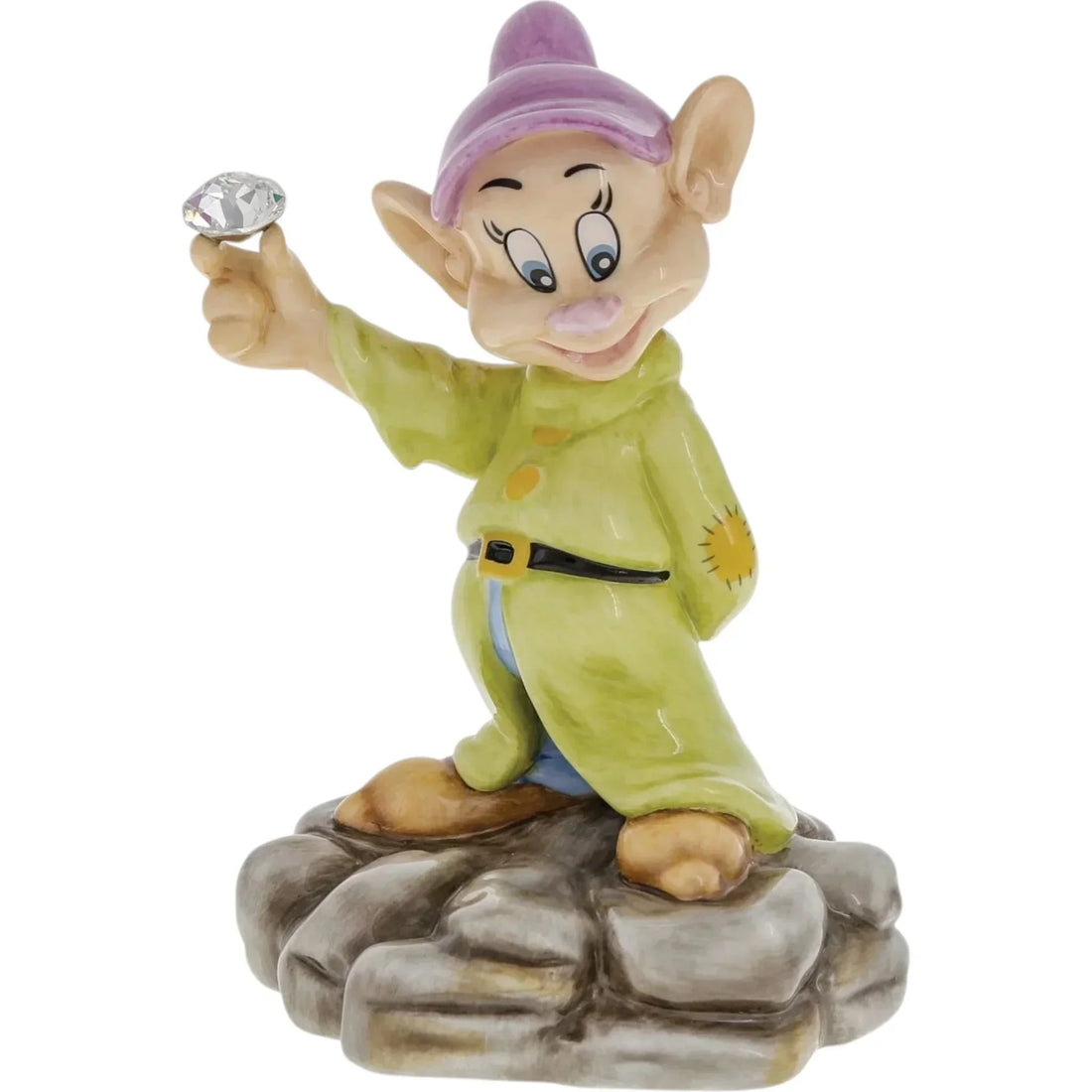 Dopey dwarf figurine holding crystal gem, vintage Disney home decor collectible on rocky base
