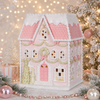 Holly & Ivy Piped Patisserie Gingerbread House in pink and white with festive decorations
