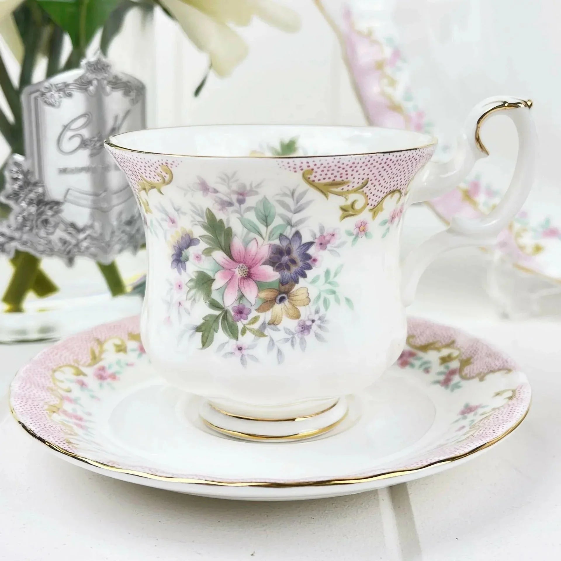 Elegant floral teacup with gold trim, perfect for home decor and tea lovers