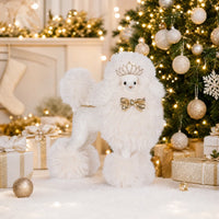 Holly & Ivy White Princess Poodle figurine with tiara and gold bow in a festive holiday setting
