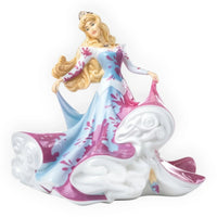 Elegant porcelain princess figurine in blue and pink gown, perfect for home décor and vintage collectors.