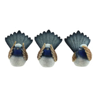 Three blue and grey bird figurines with fanned tails, home décor accents