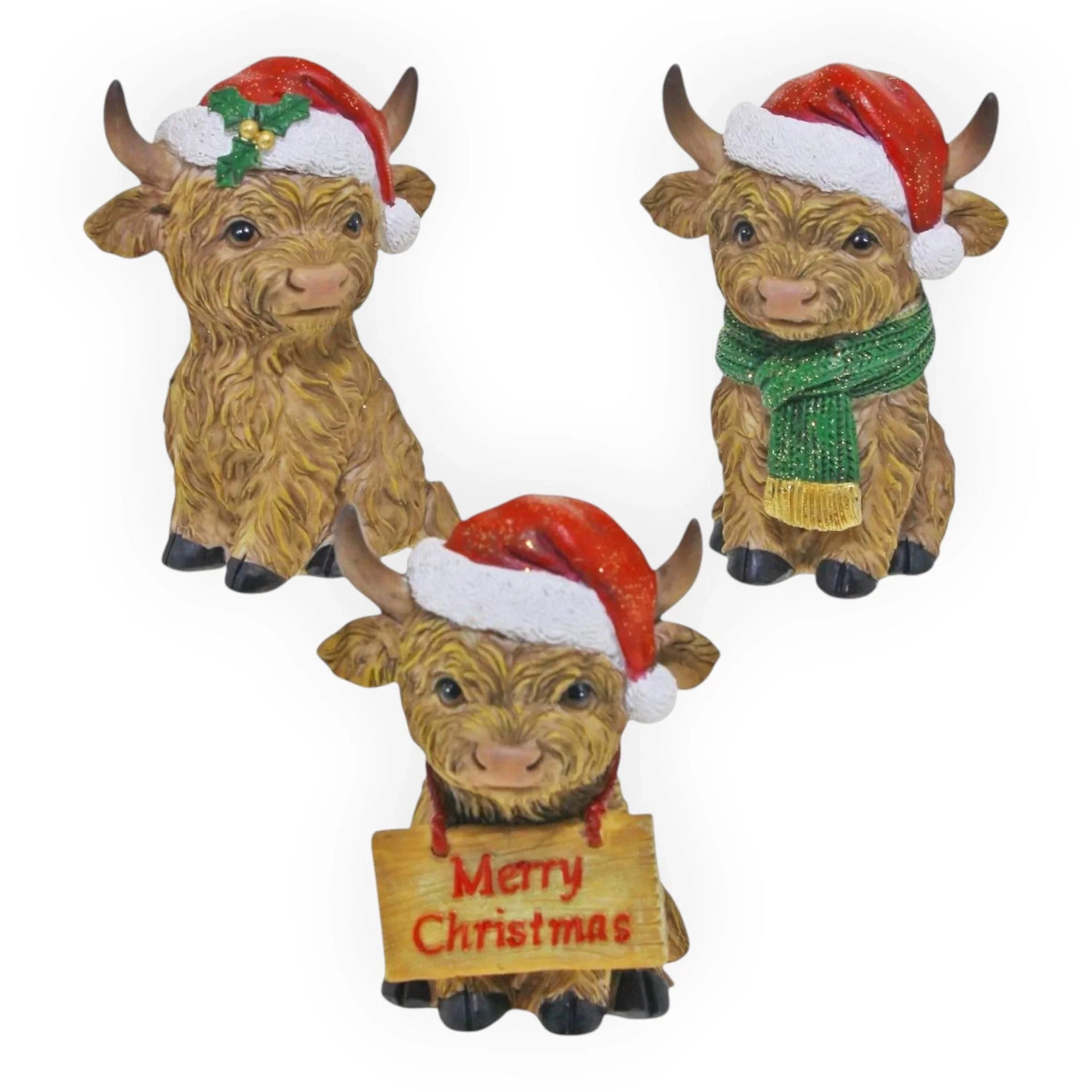 Set of 3 festive Highland cow figurines with Santa hats, scarf, and Merry Christmas sign for holiday home décor