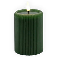 Coast to Coast LED flameless green ribbed pillar candle with flickering flame tip