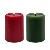 Red and green ribbed LED candles for home décor, festive ambiance