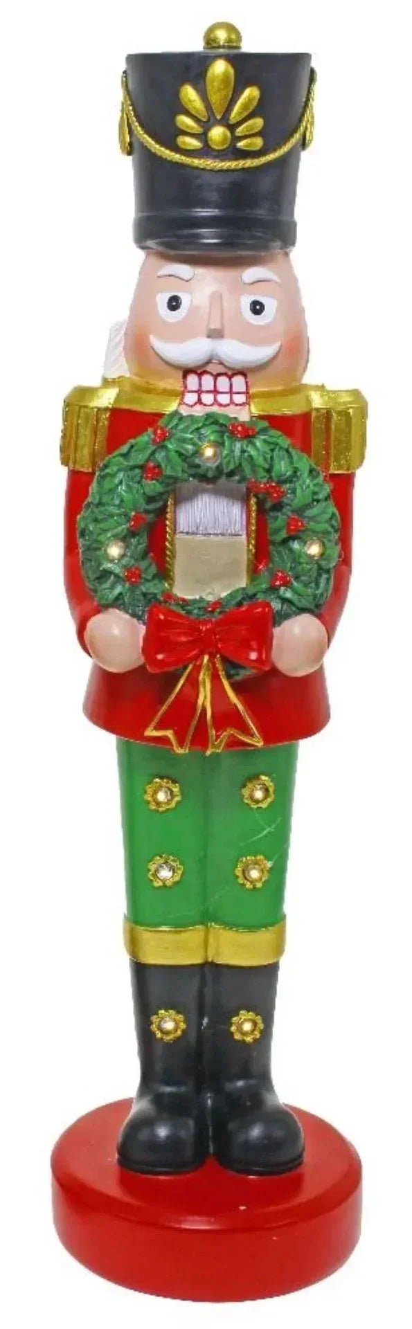 Christmas nutcracker holding wreath, festive holiday decor with red, green, gold accents
