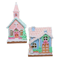 Pastel gingerbread church and house with snow, bows, wreaths, and festive details for holiday décor