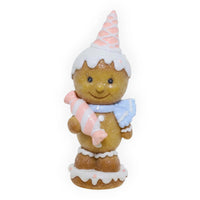 Charming gingerbread figurine with pink hat, blue scarf, and candy cane, perfect for festive home décor