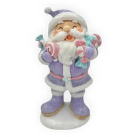 Purple Santa figurine holding pastel candy canes, festive holiday home décor with glittery details